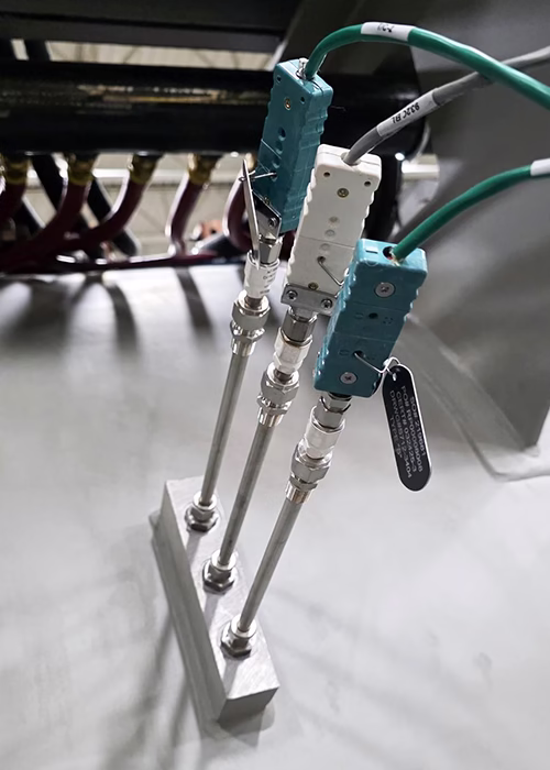 Control and Overtemp thermocouples exterior view of vacuum furnace